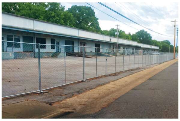 Temporary chain link fence set up around active construction site in Memphis, TN by Bluff City Fence
