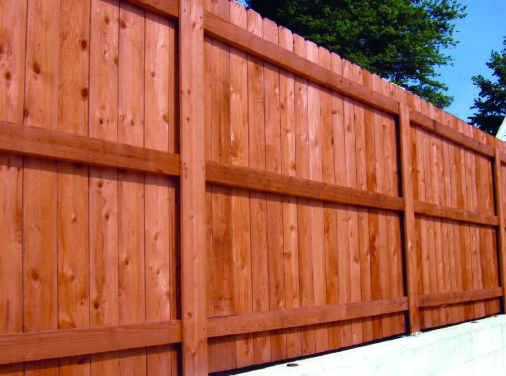 A beautiful residential fence built using the new PostMaster hidden post system.